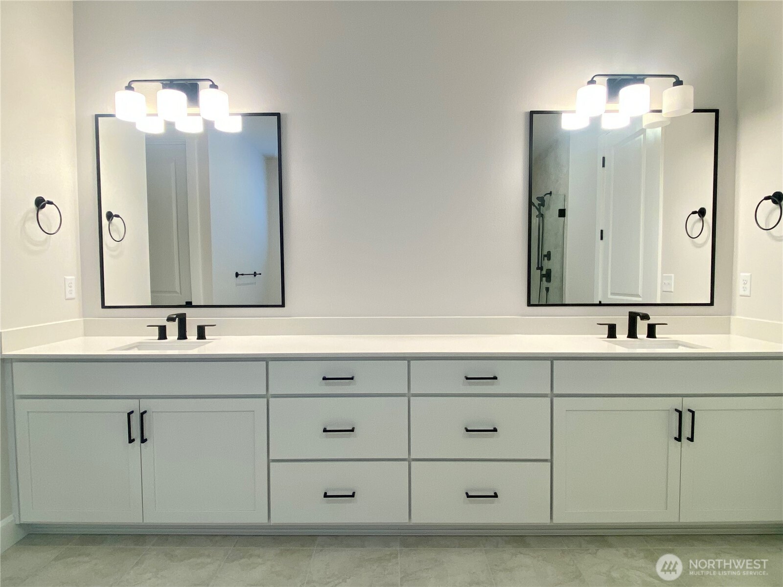 2526 Acer Loop Southeast Lacey, WA 98513 - Photo 4 of 19 a bathroom with a double vanity sink mirror and