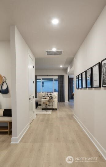 2526 Acer Loop Southeast Lacey, WA 98513 - Photo 10 of 19 a living room with furniture and a lamp