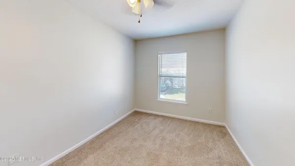 an empty room with a window