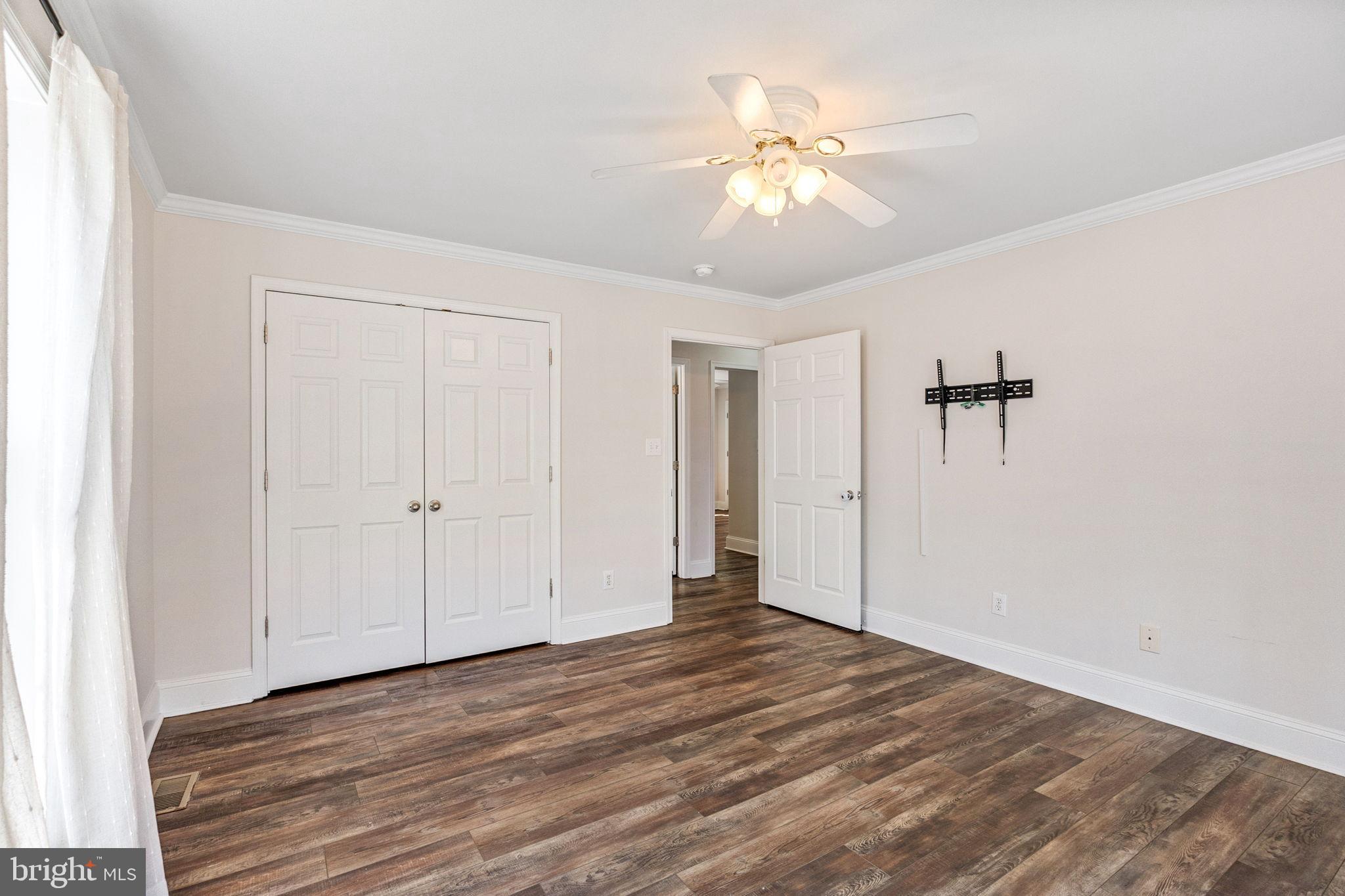 16352 Bullocks Road Ruther Glen, VA 22546 - Photo 23 of 29 a view of a room with wooden floor