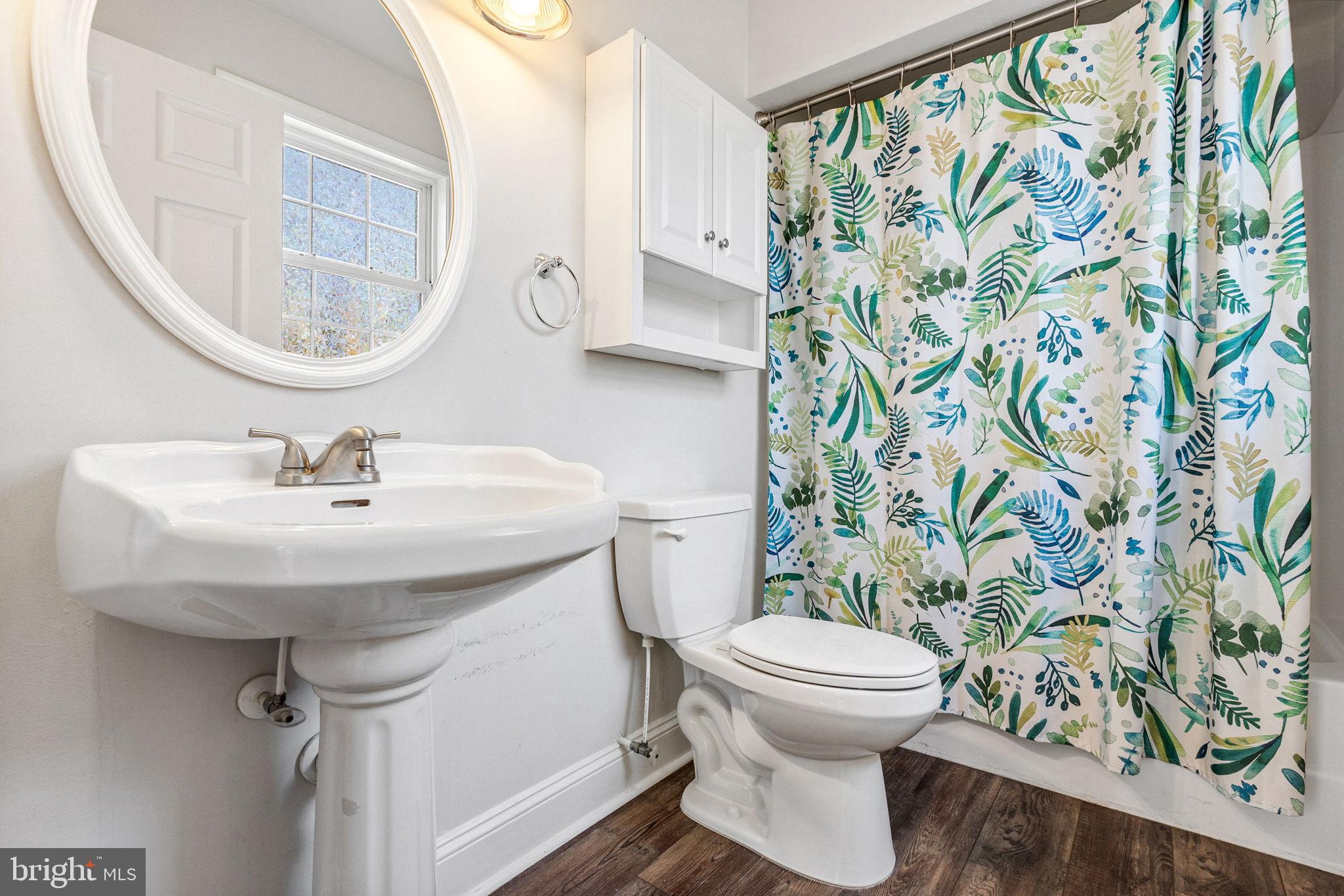 16352 Bullocks Road Ruther Glen, VA 22546 - Photo 24 of 29 a bathroom with a sink and a mirror