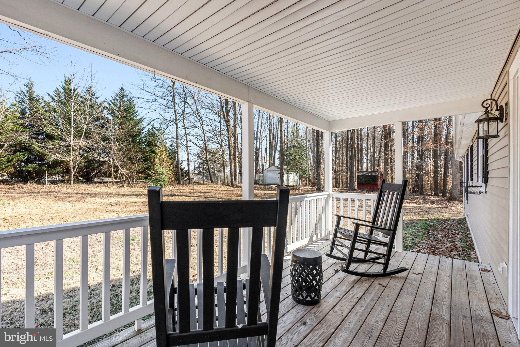 16352 Bullocks Road Ruther Glen, VA 22546 - Photo 5 of 29 a view of a chairs on the roof deck