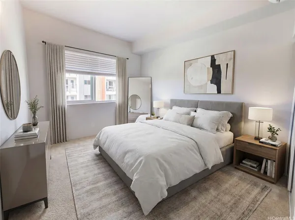 a bedroom with a bed and a lamp on dresser