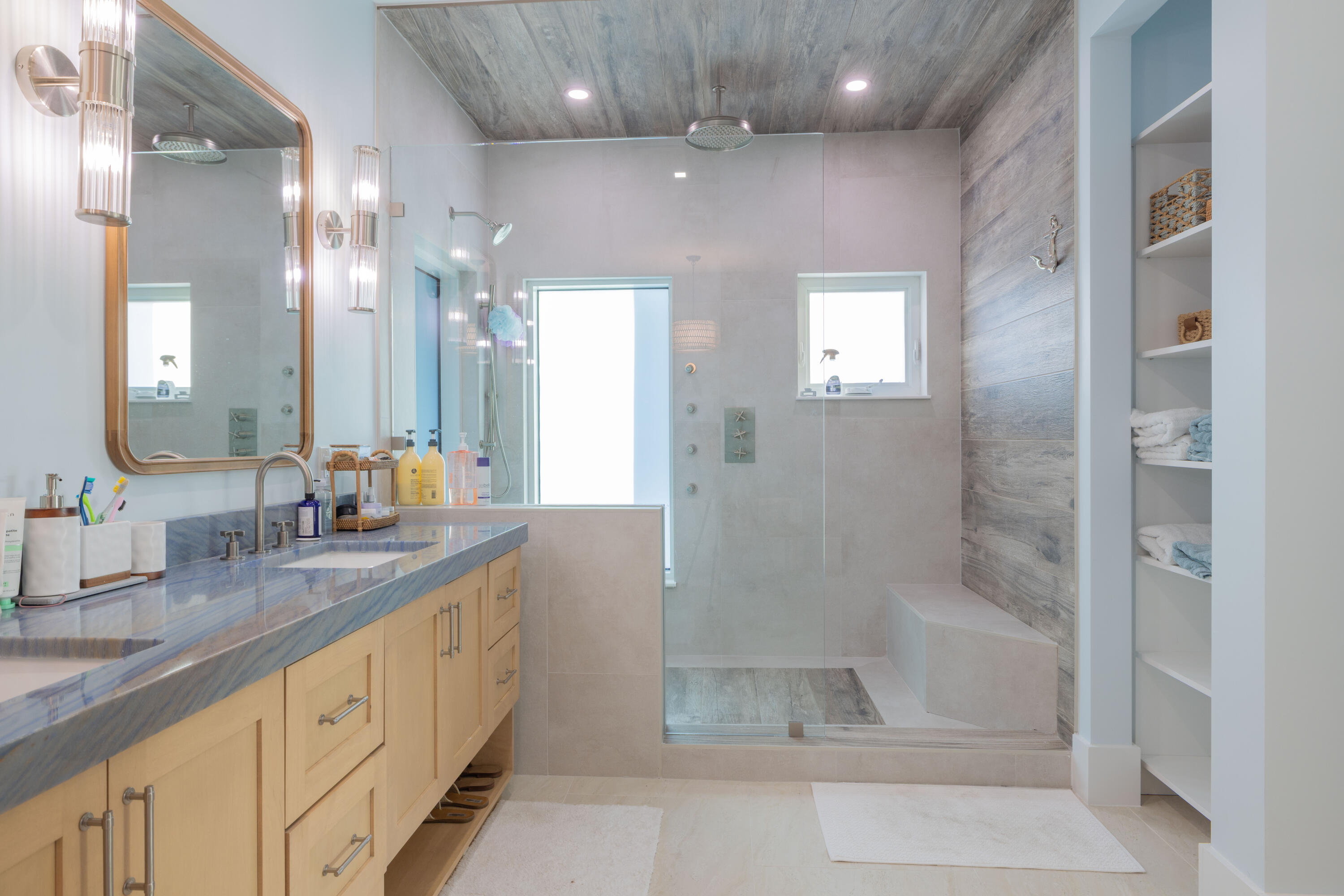 241 12th Street Key Colony Beach, FL 33051 - Photo 19 of 74 a bathroom with a granite countertop sink mirror and shower