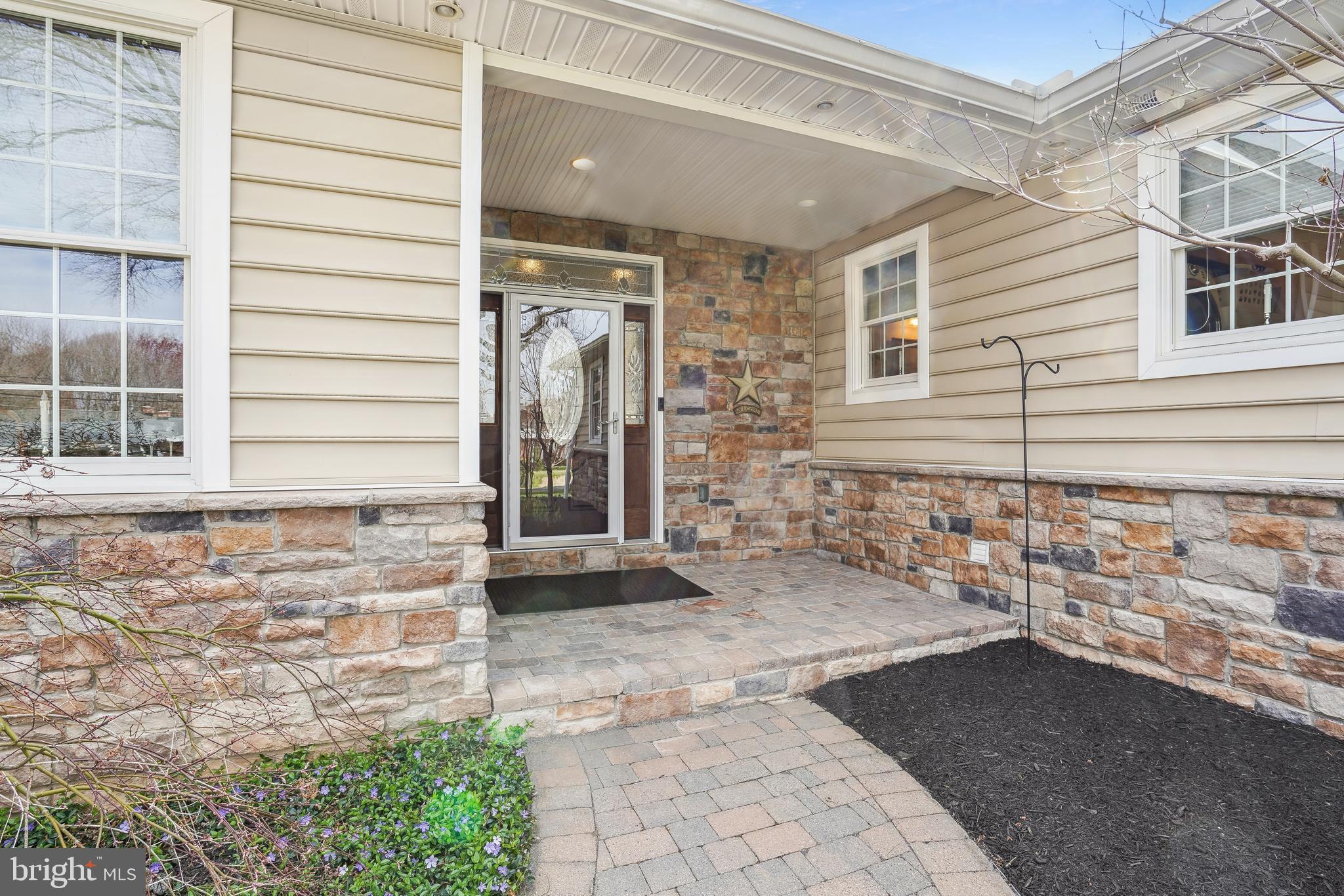103 Calvert Road Stevensville, MD 21666 - Photo 12 of 59 Welcoming Covered Entry Porch