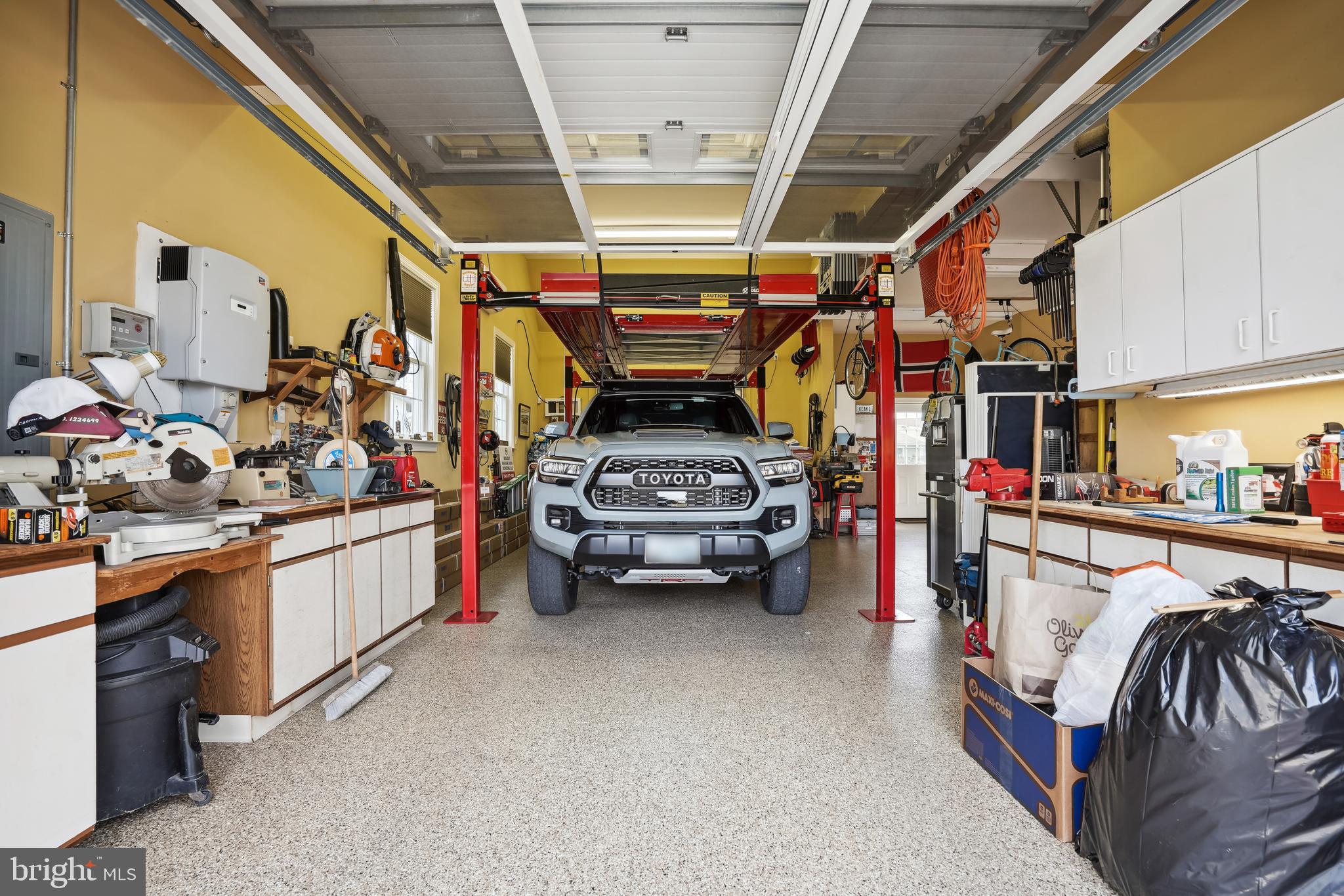 103 Calvert Road Stevensville, MD 21666 - Photo 7 of 59 Car Lift . EV Charging Station . Epoxy Floor