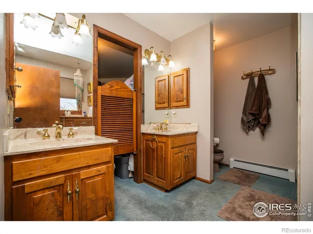 a bathroom with a sink a mirror and a shower