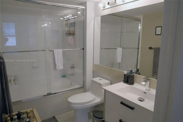 a kitchen with a table and chairs in it