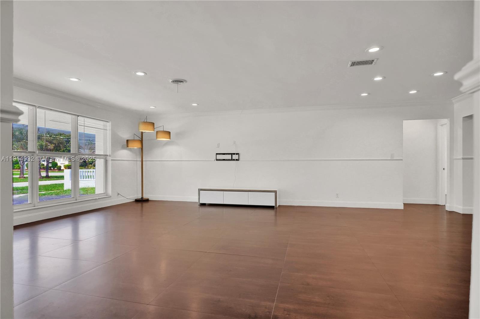 4721 West Park Road Hollywood, FL 33021 - Photo 16 of 34 a view of a livingroom with wooden floor