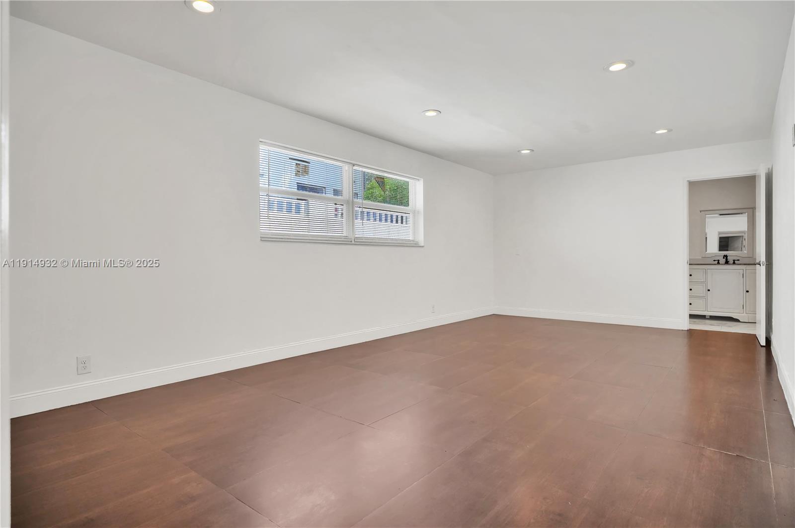 4721 West Park Road Hollywood, FL 33021 - Photo 18 of 34 an empty room with a empty space and windows