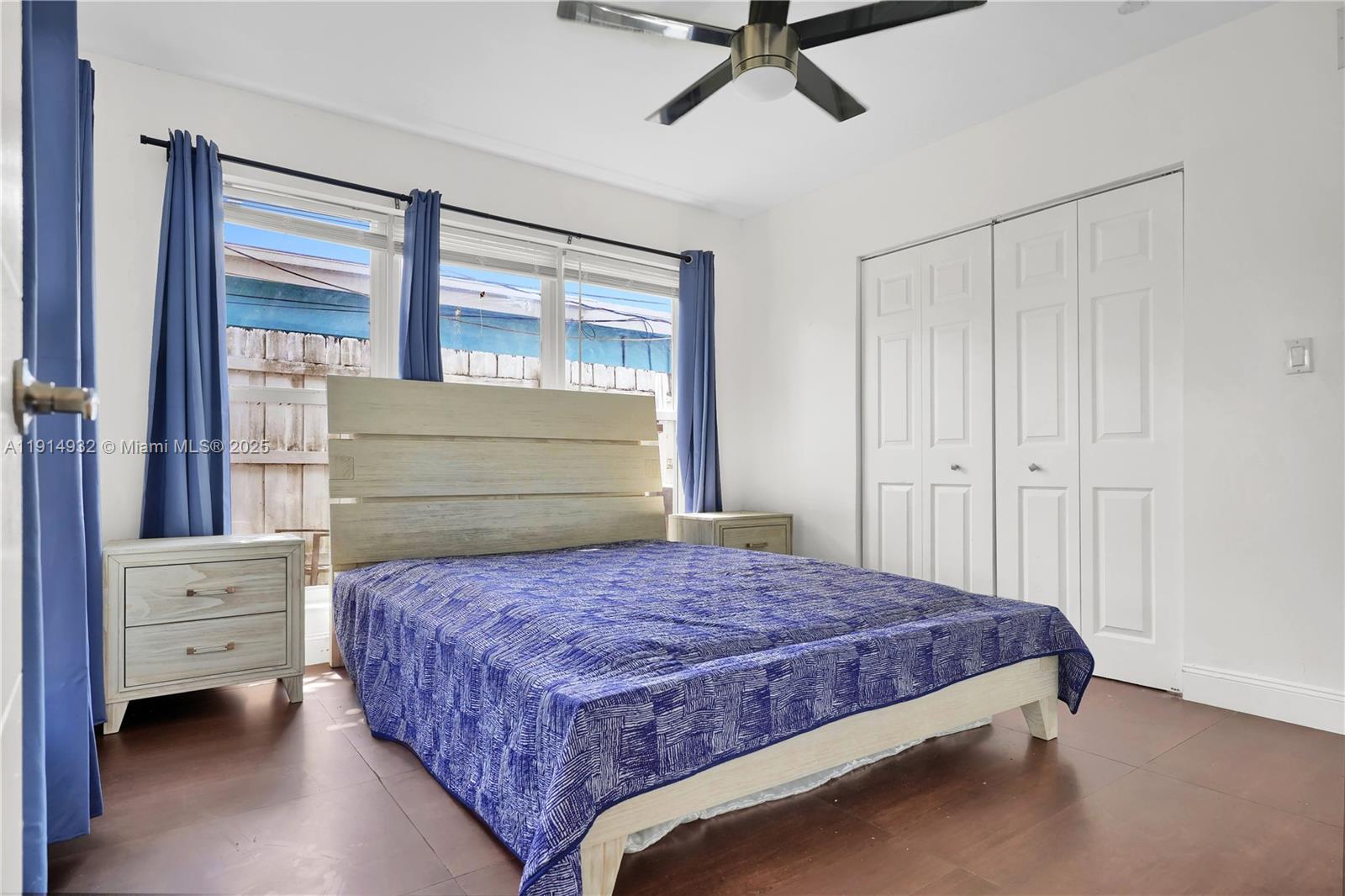 4721 West Park Road Hollywood, FL 33021 - Photo 19 of 34 a bedroom with a bed and a window