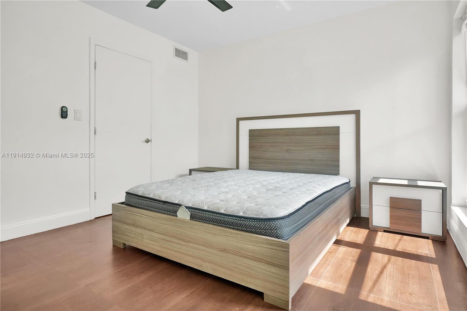 4721 West Park Road Hollywood, FL 33021 - Photo 30 of 34 a bedroom with a bed and a window