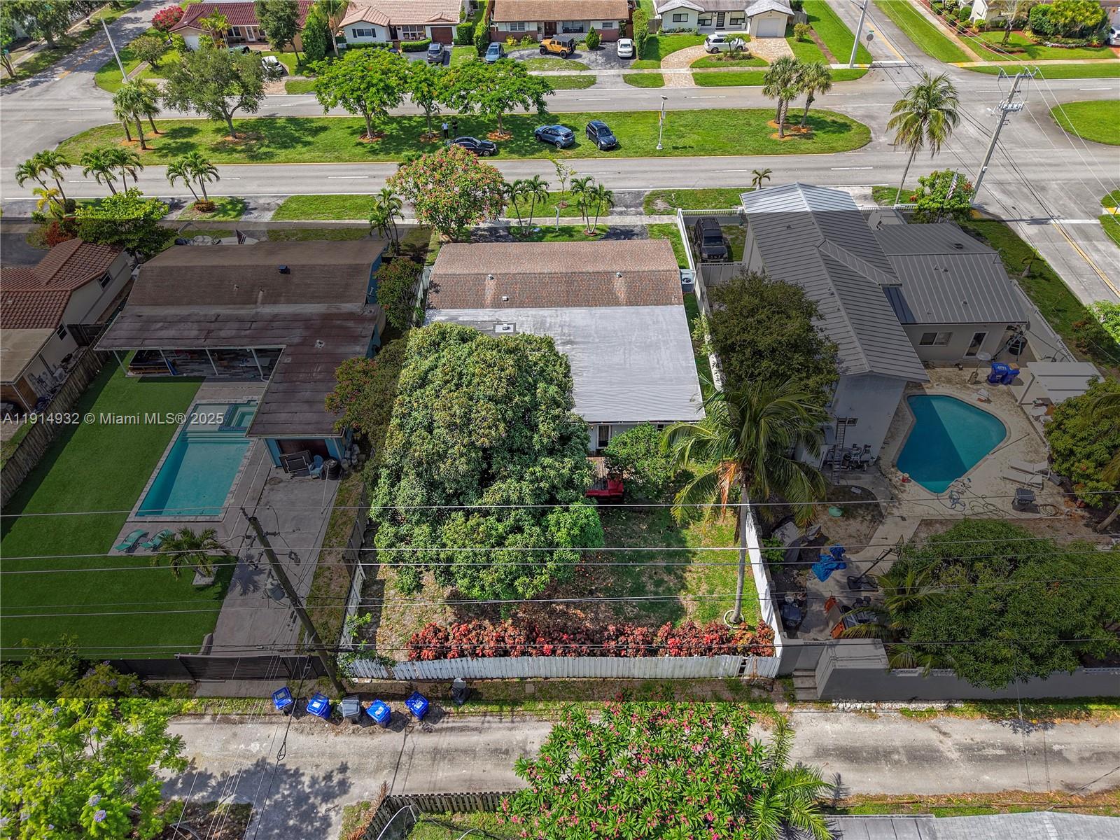 4721 West Park Road Hollywood, FL 33021 - Photo 5 of 34 an aerial view of a house with a yard basket ball court and outdoor seating