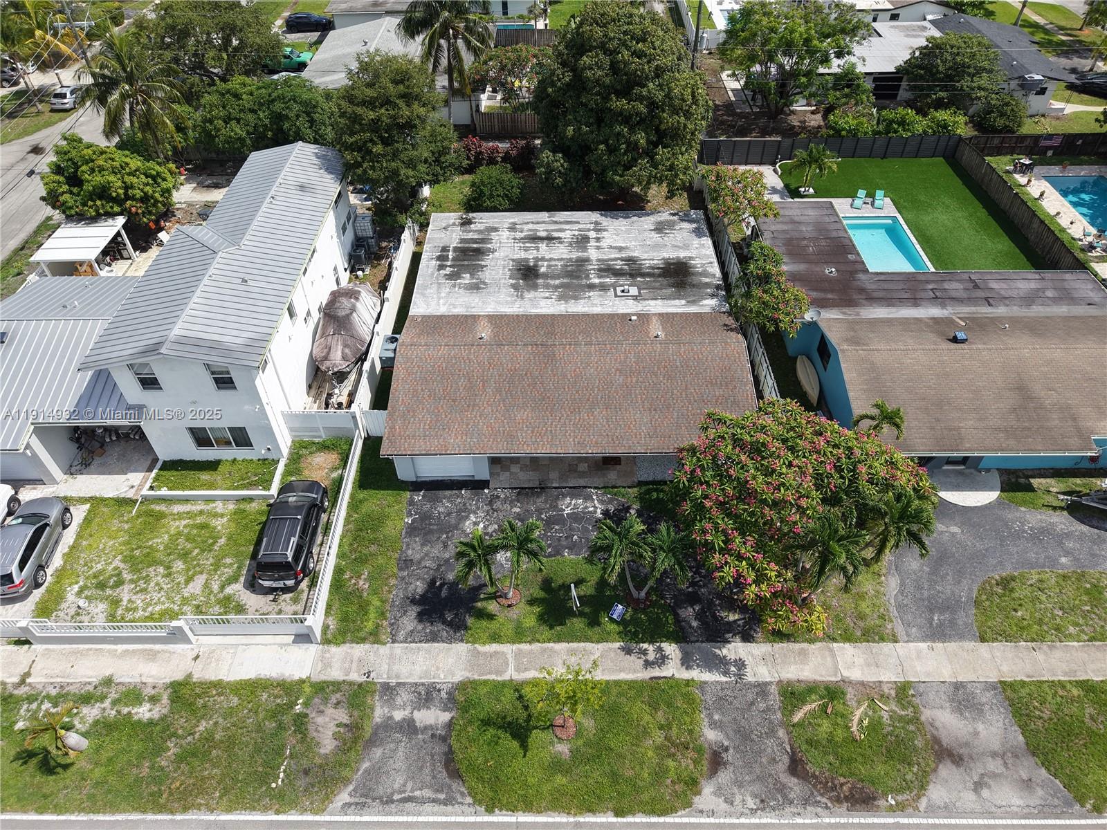 4721 West Park Road Hollywood, FL 33021 - Photo 6 of 34 an aerial view of a house with yard and lake view