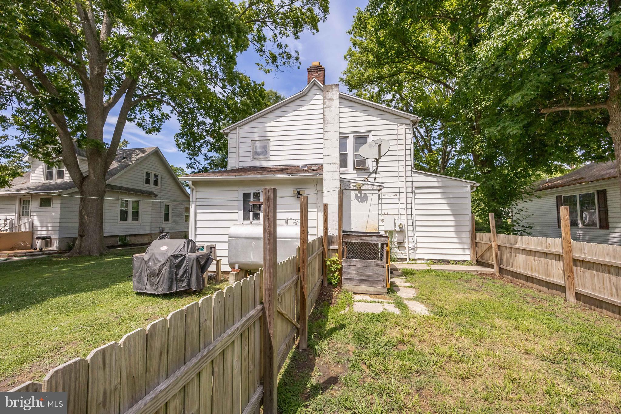 26467 Mariners Road Crisfield, MD 21817 - Photo 42 of 44 a front view of house with yard and seating area