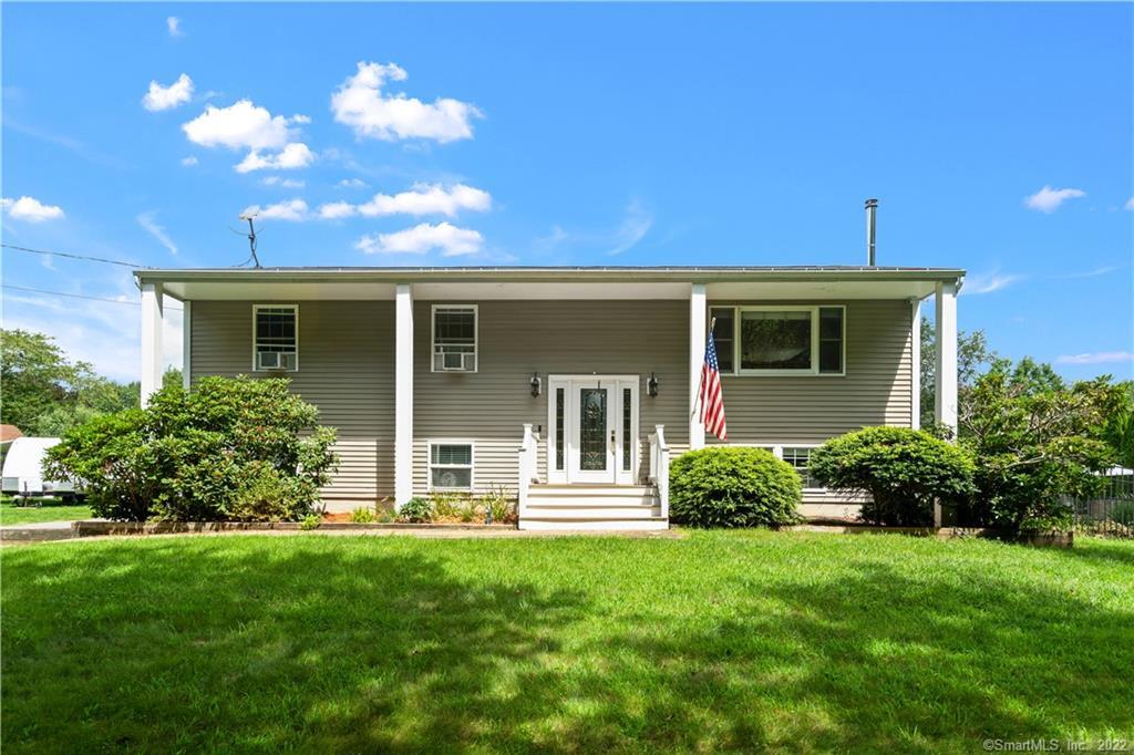 Front of house with trex porch