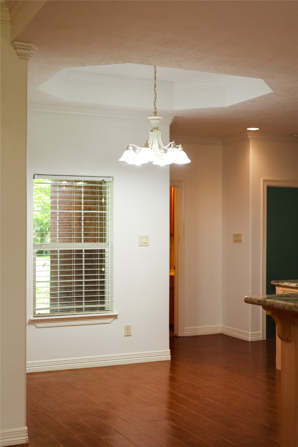 5468 Hogaboom Road Groves, TX 77619 - Photo 7 of 18 a view of a livingroom with wooden floor and a large window