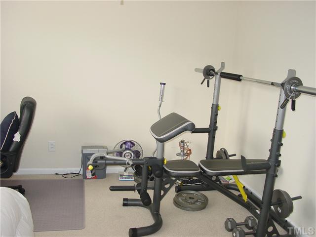 7672 Winners Edge Street Raleigh, NC 27617 - Photo 13 of 17 Another view of this bedroom. Alll the furniture and gym equipment stay with this home!