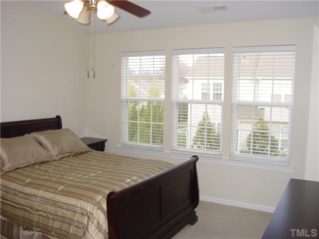 7672 Winners Edge Street Raleigh, NC 27617 - Photo 8 of 17 One of the two master bedrooms with its own big beautiful baths. All furniture stays with this home!
