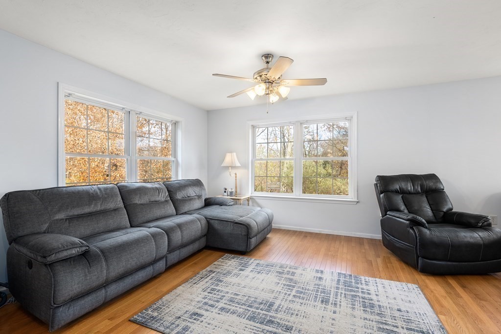 597 Old Warren Road Palmer, MA 01069 - Photo 12 of 37 a living room with furniture and a window