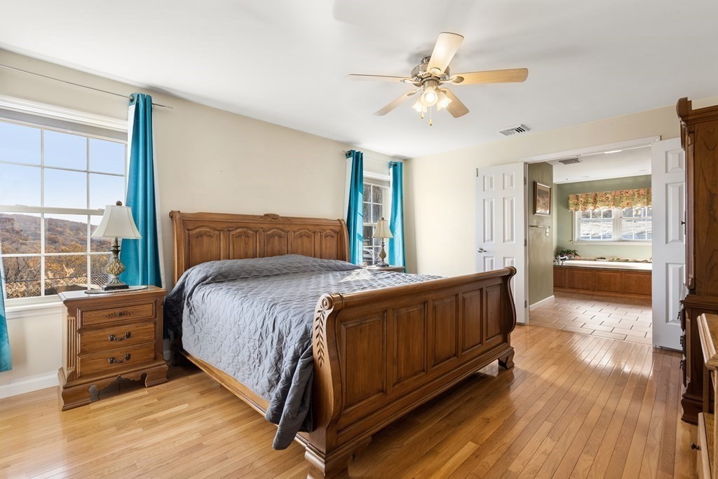 597 Old Warren Road Palmer, MA 01069 - Photo 16 of 37 a bedroom with a bed and window