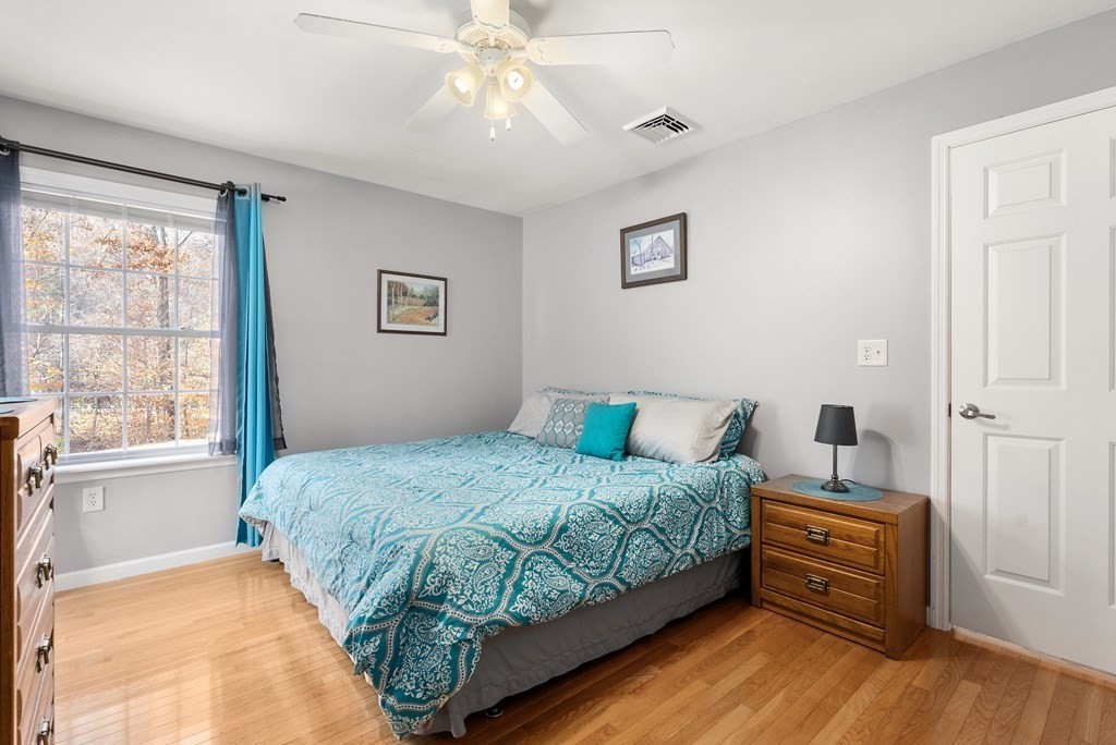 597 Old Warren Road Palmer, MA 01069 - Photo 22 of 37 a bedroom with a bed and a window