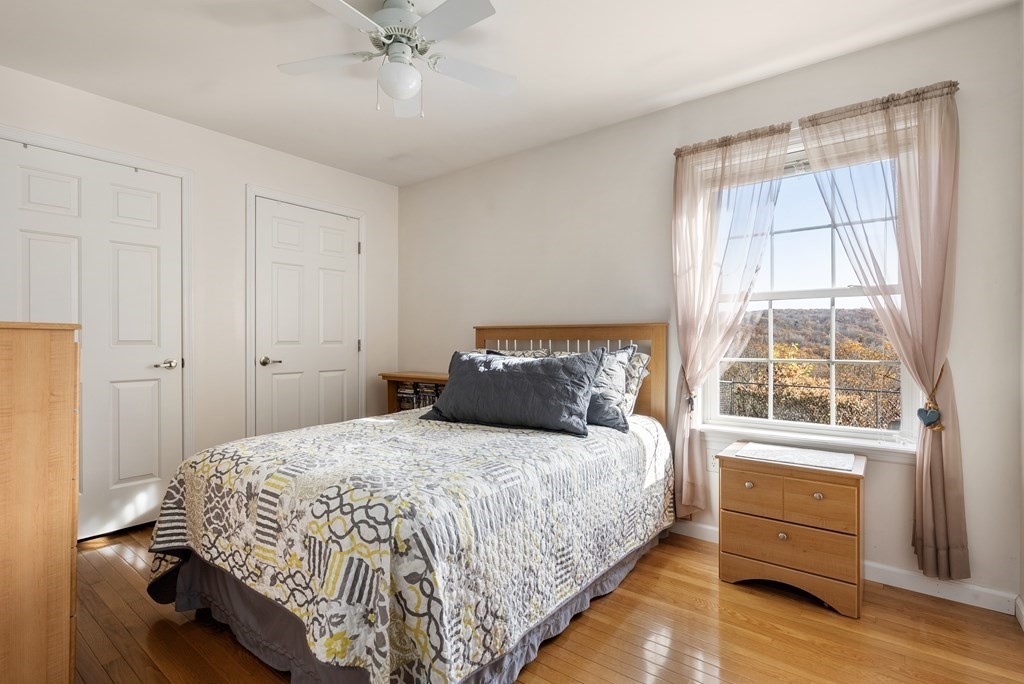 597 Old Warren Road Palmer, MA 01069 - Photo 24 of 37 a bedroom with a bed and a window
