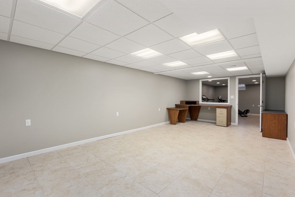 597 Old Warren Road Palmer, MA 01069 - Photo 28 of 37 a room with furniture and kitchen