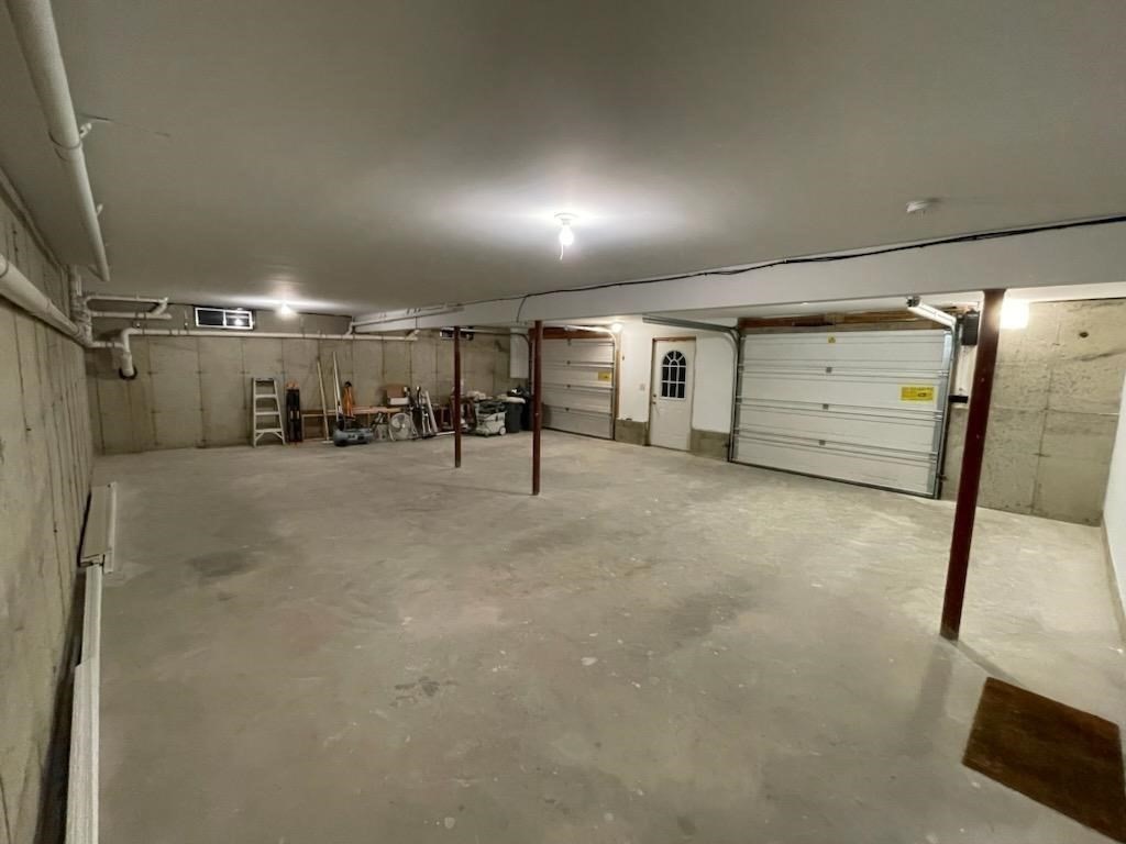 597 Old Warren Road Palmer, MA 01069 - Photo 30 of 37 a view of a room with gym equipment