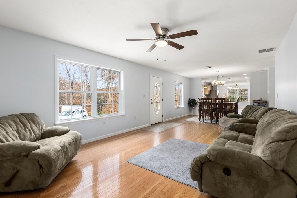 597 Old Warren Road Palmer, MA 01069 - Photo 3 of 37 a living room with furniture and a large window