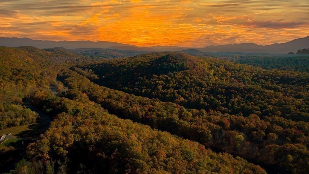597 Old Warren Road Palmer, MA 01069 - Photo 35 of 37 a view of a city with mountains in the background