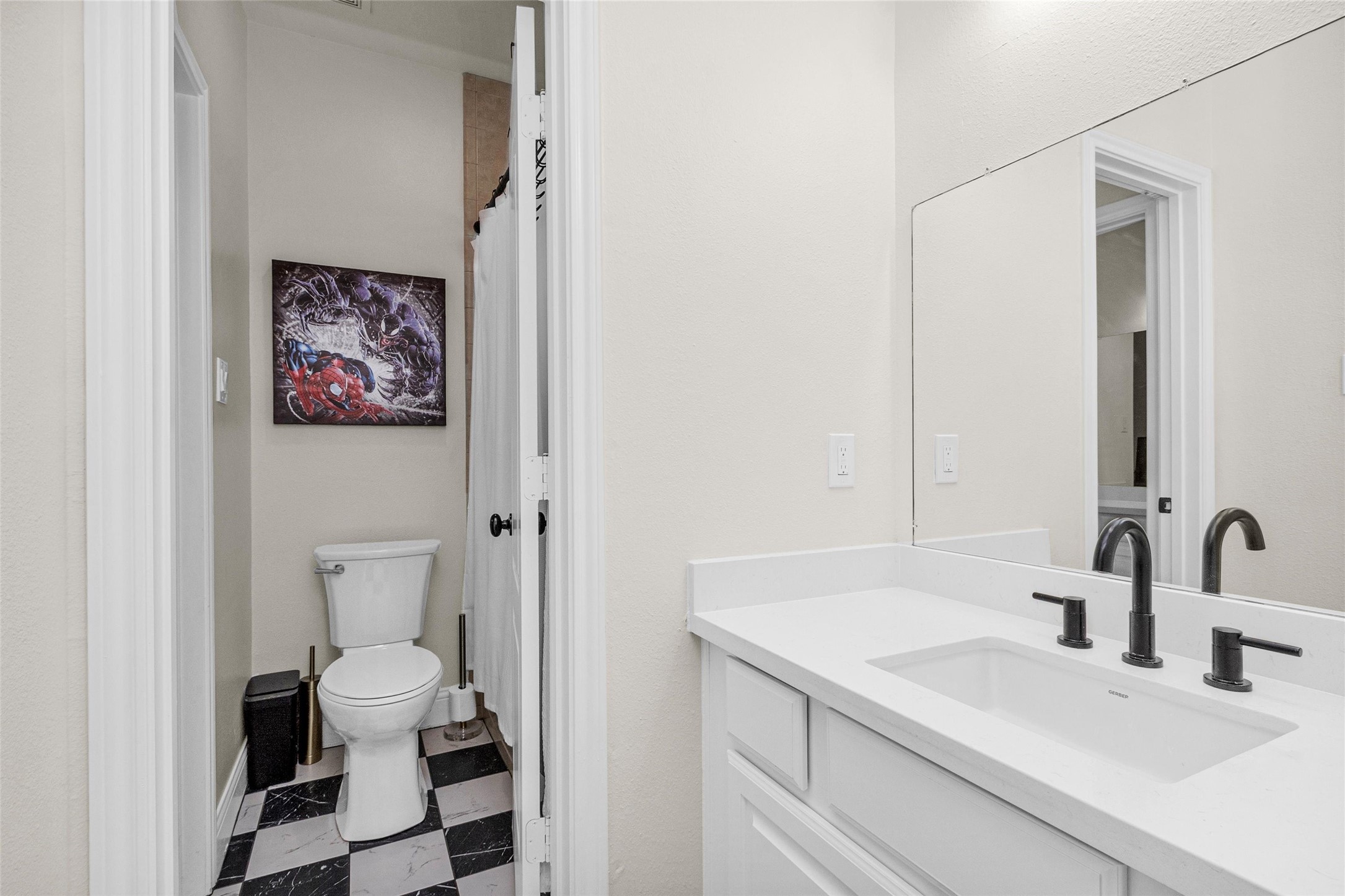 10004 Summer Ridge Lane Conroe, TX 77302 - Photo 42 of 50 a bathroom with a sink and a mirror