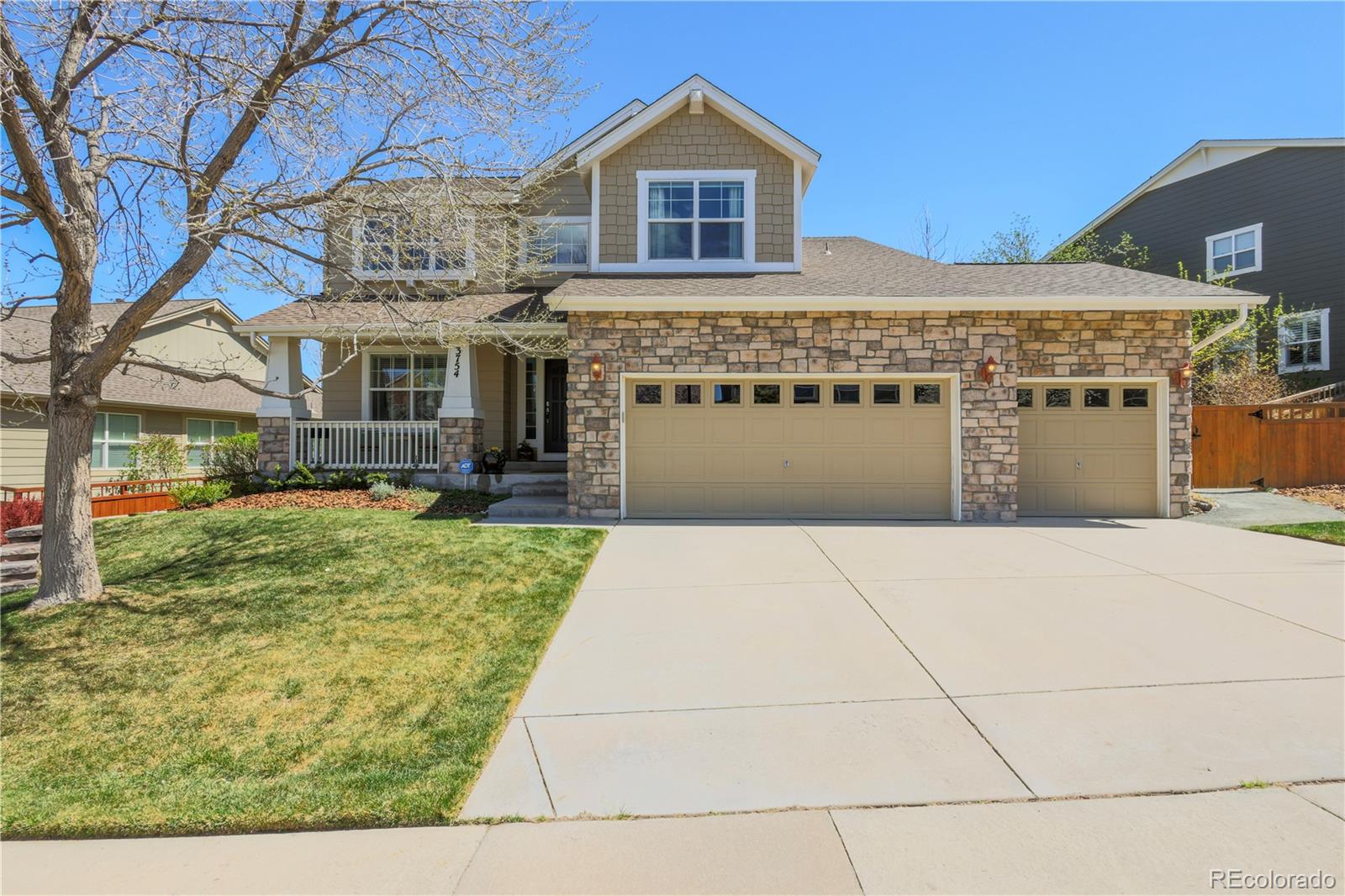 3754 Broadview Place Castle Rock, CO 80109 - Photo 1 of 43 a front view of a building with a garden