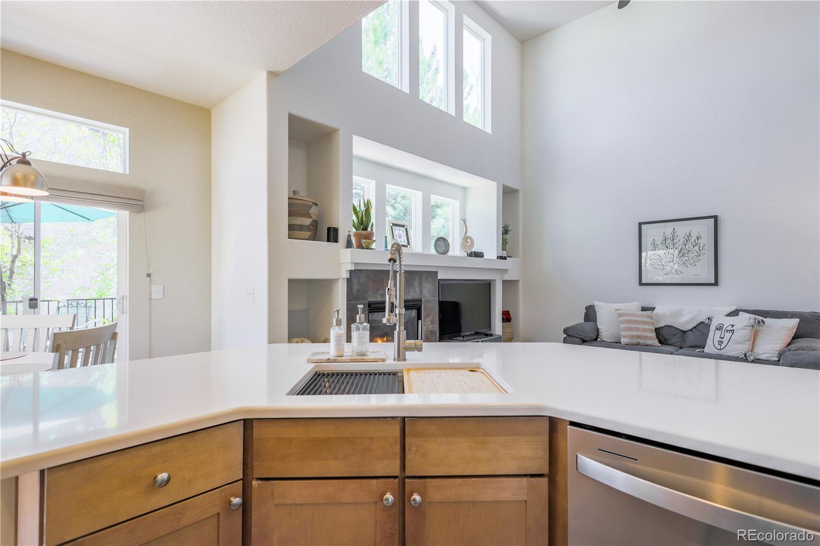 3754 Broadview Place Castle Rock, CO 80109 - Photo 12 of 43 a living room with furniture and a fireplace