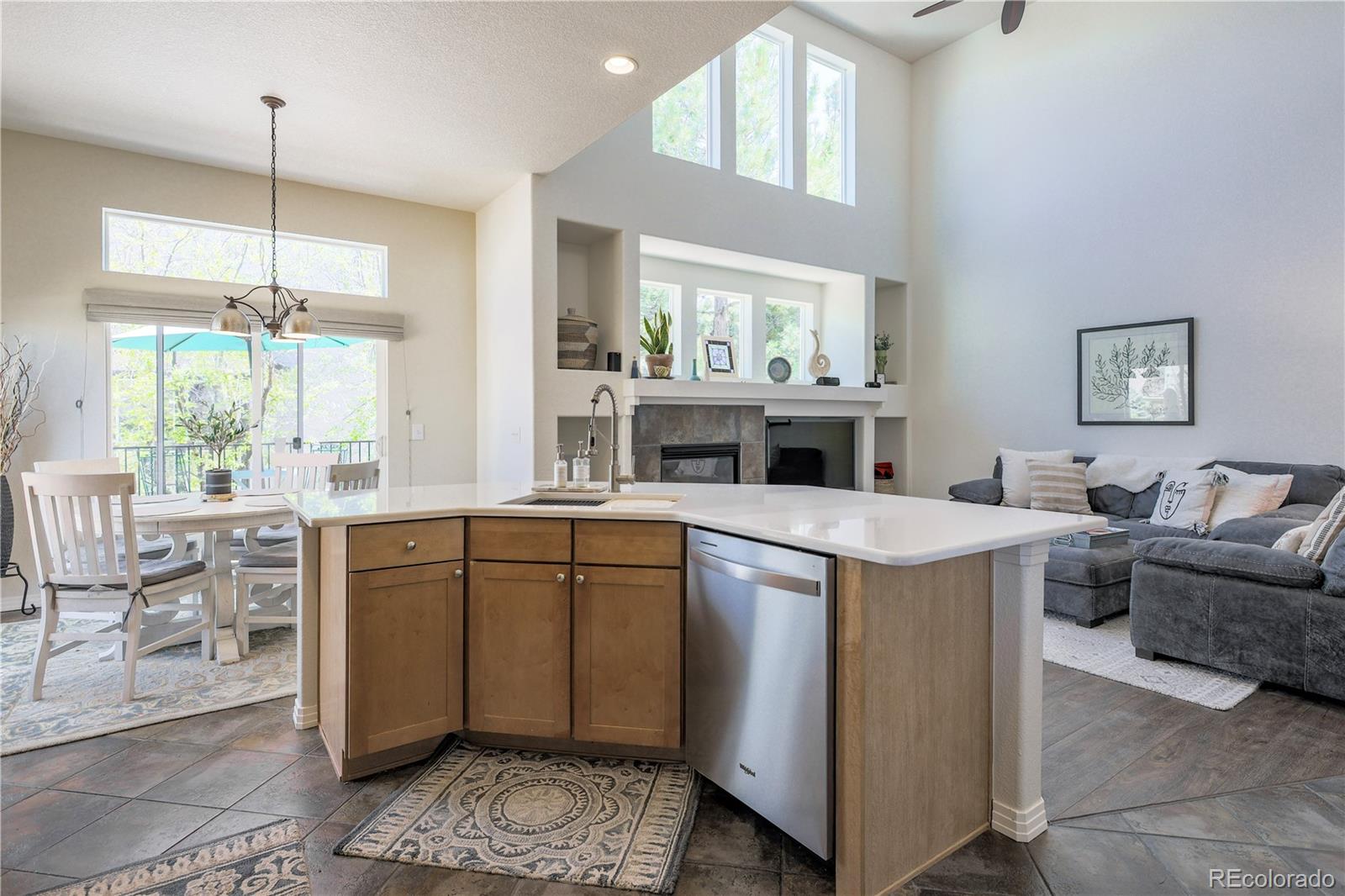3754 Broadview Place Castle Rock, CO 80109 - Photo 13 of 43 a kitchen with stainless steel appliances granite countertop a stove and a wooden floors
