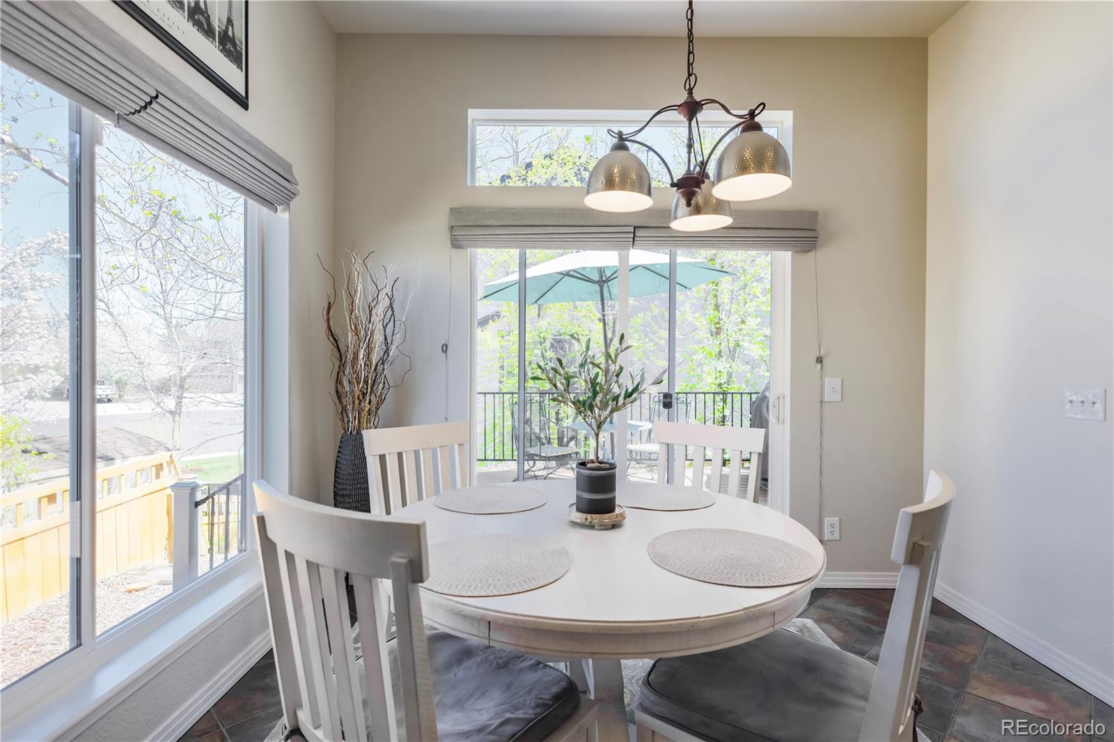 3754 Broadview Place Castle Rock, CO 80109 - Photo 15 of 43 a view of a dining room with furniture window and outside view