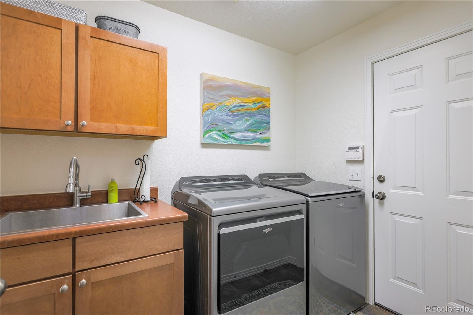 3754 Broadview Place Castle Rock, CO 80109 - Photo 25 of 43 a utility room with dryer and washer