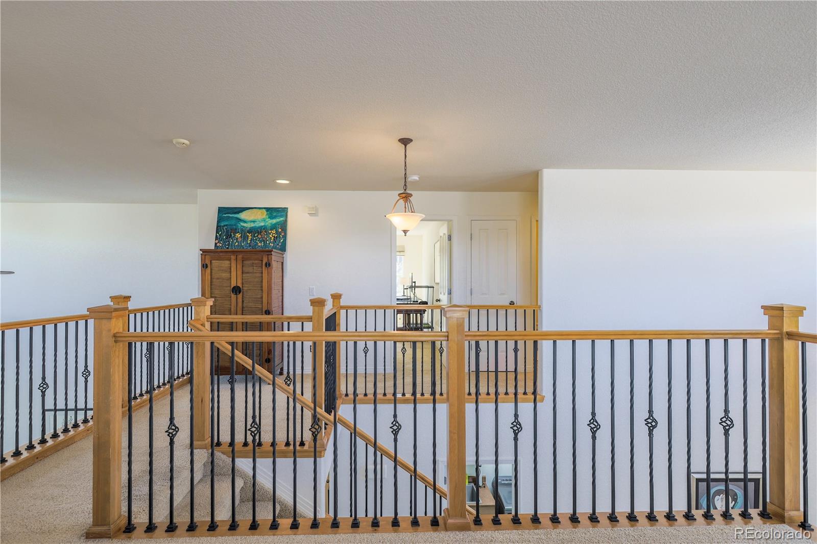 3754 Broadview Place Castle Rock, CO 80109 - Photo 29 of 43 a view of a hallway with windows