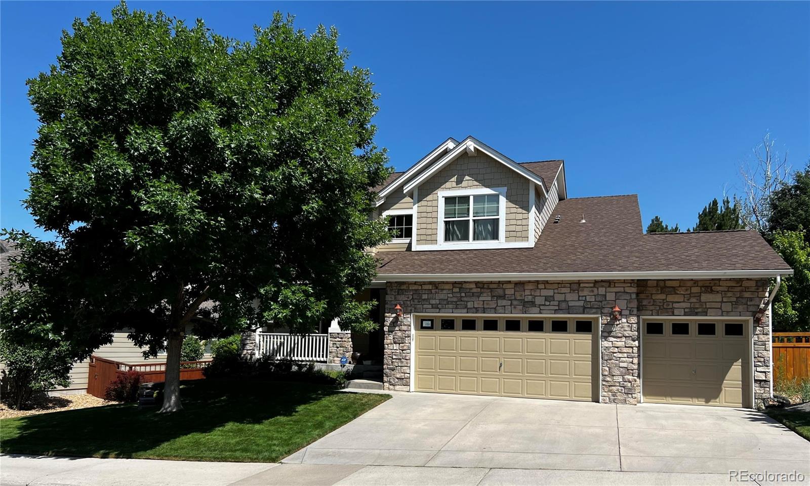 3754 Broadview Place Castle Rock, CO 80109 - Photo 40 of 43 a front view of a house with a garage