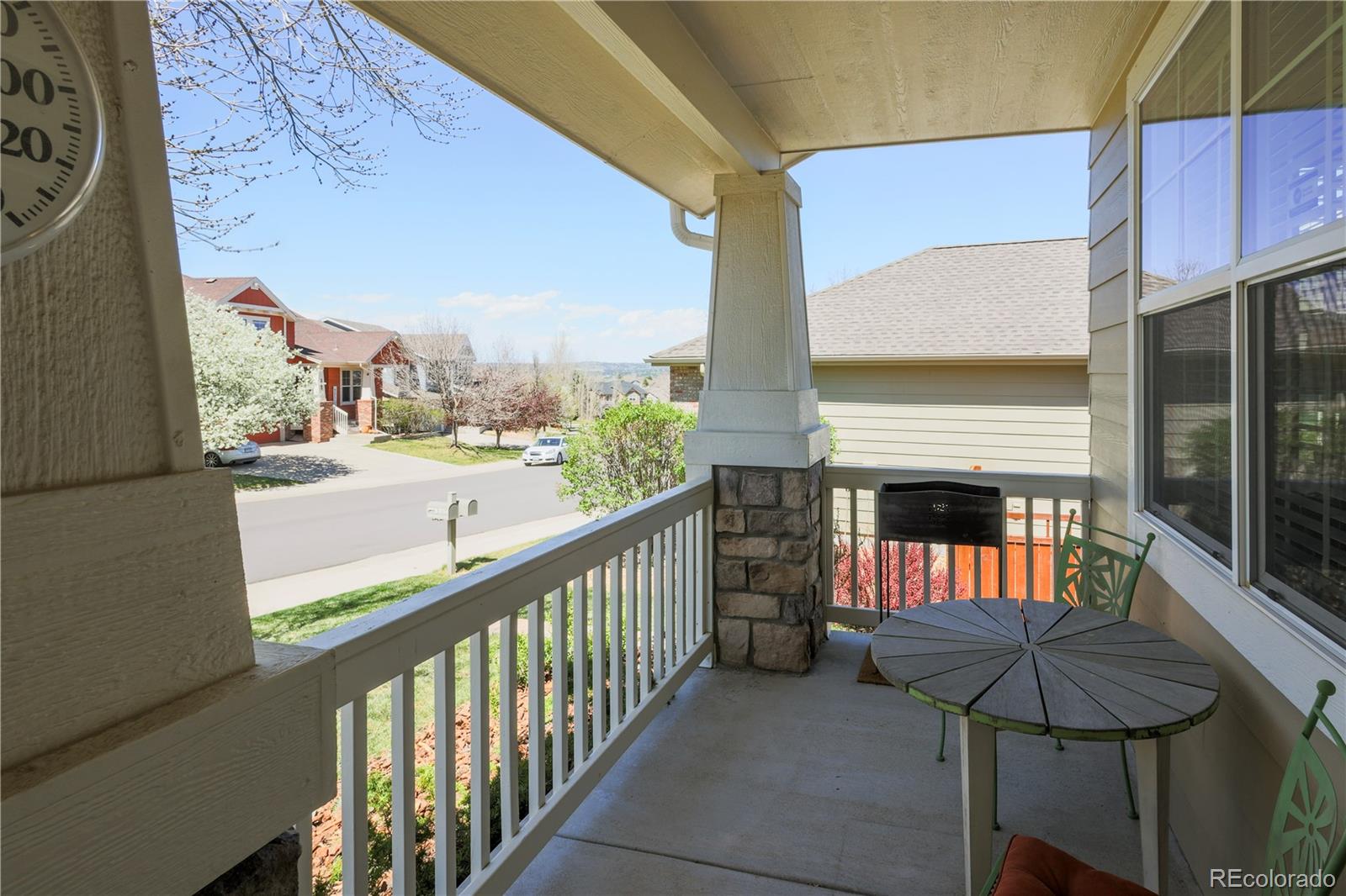 3754 Broadview Place Castle Rock, CO 80109 - Photo 4 of 43 a view of a chairs and table in the balcony