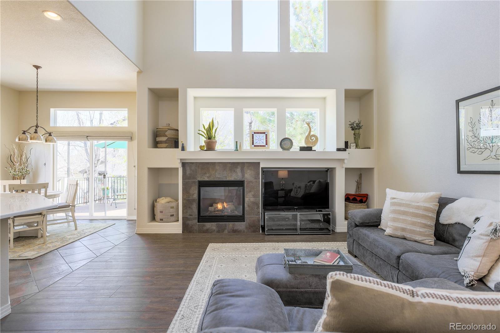 3754 Broadview Place Castle Rock, CO 80109 - Photo 5 of 43 a living room with furniture and a fireplace