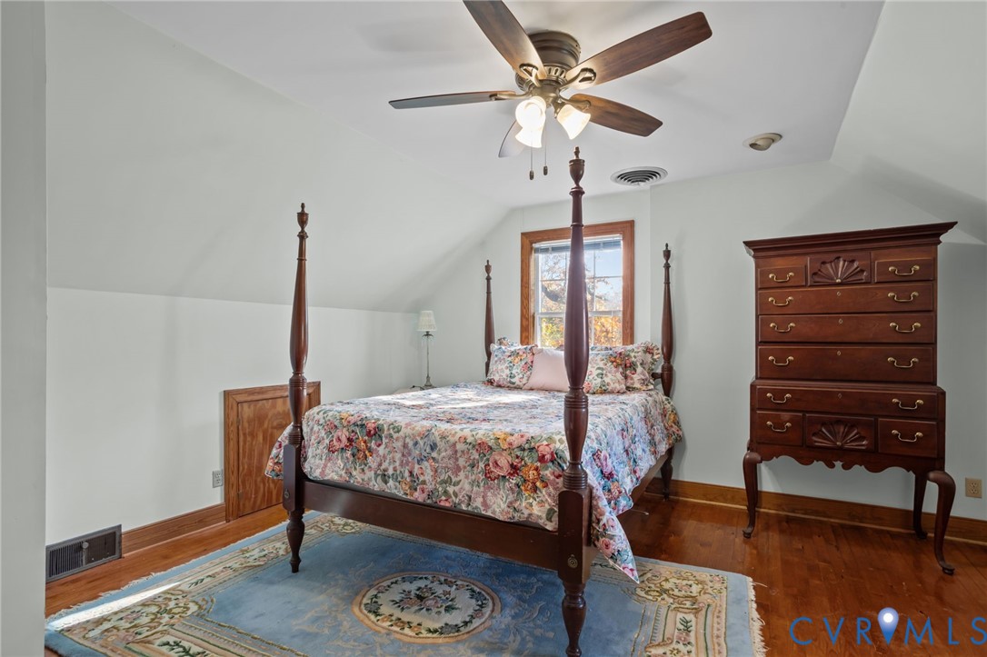 6800 Bethlehem Road Henrico, VA 23228 - Photo 12 of 25 Bedroom with dark wood-type flooring, vaulted ceil