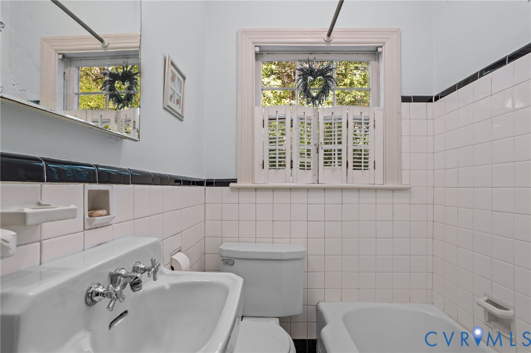 6800 Bethlehem Road Henrico, VA 23228 - Photo 15 of 25 Bathroom with tile walls, plenty of natural light,