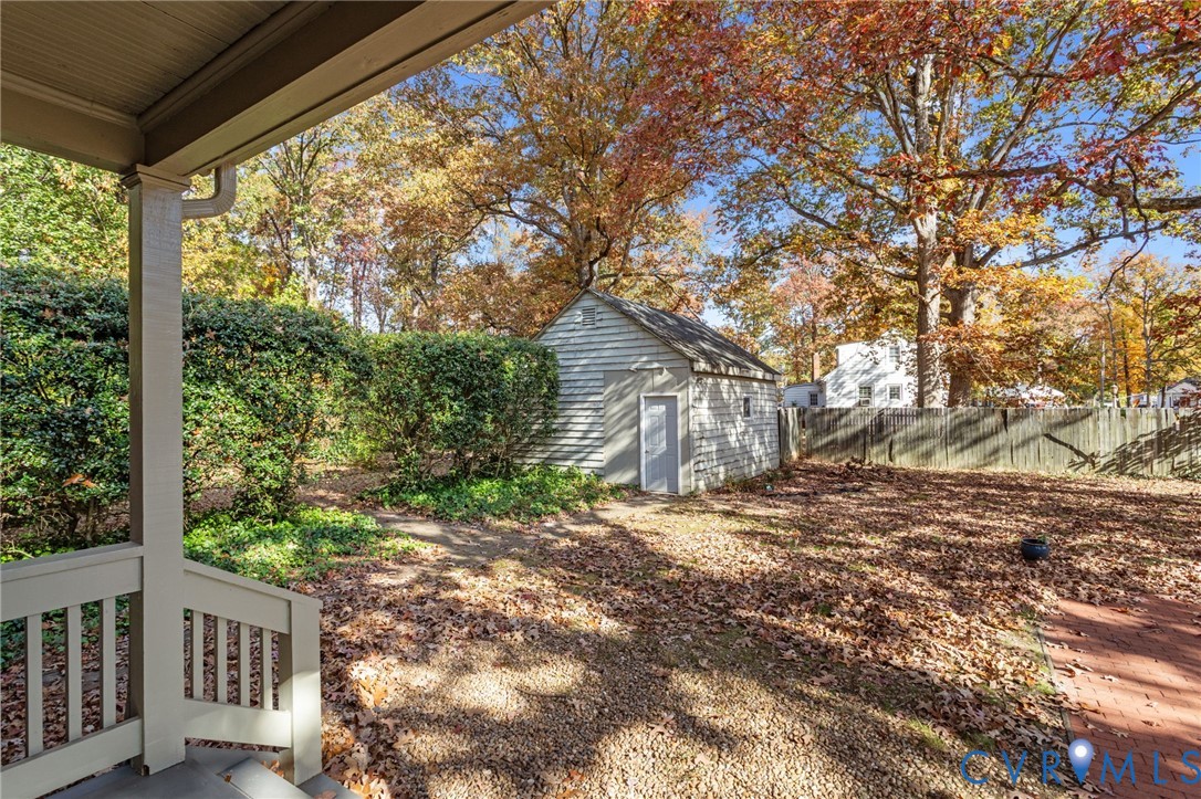6800 Bethlehem Road Henrico, VA 23228 - Photo 20 of 25 Fenced yard with a shed and covered porch