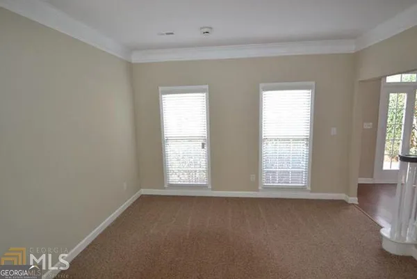 an empty room with windows