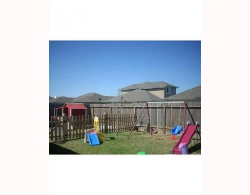 a view of swimming pool with outdoor seating