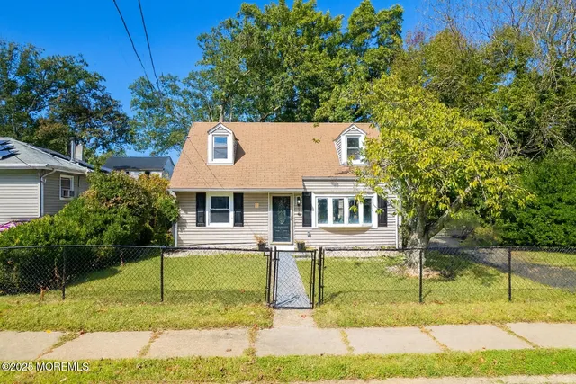 front view of house with a yard