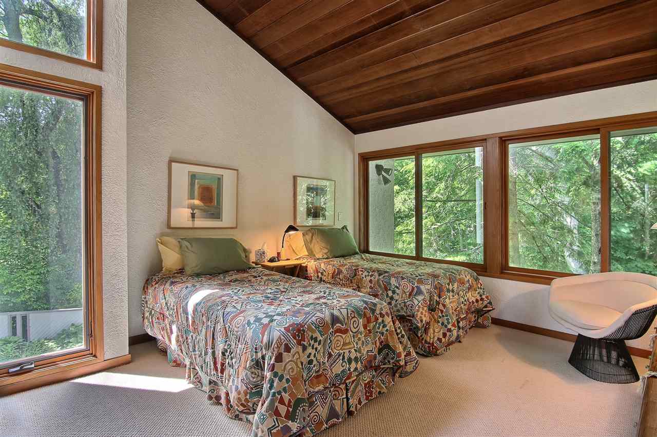 600 Riverside Road Belvidere, IL 61008 - Photo 17 of 25 a bed sitting in a bedroom next to a window