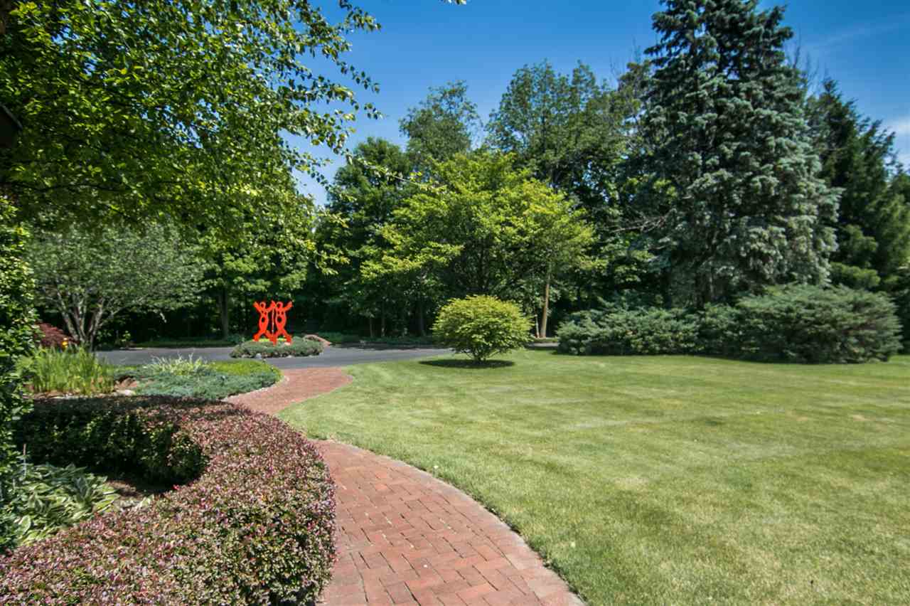 600 Riverside Road Belvidere, IL 61008 - Photo 23 of 25 a view of a garden with a tree