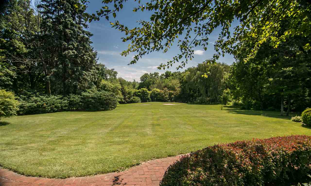 600 Riverside Road Belvidere, IL 61008 - Photo 24 of 25 a view of a swimming pool with a backyard